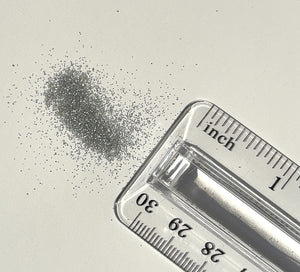 Biodegradable Plastic free Fairy Silver ultra fine glitter small amount next to ruler