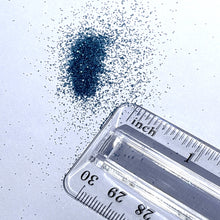 Metallic Deep Sea Blue ultrafine biodegradable glitter size against ruler