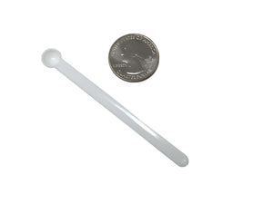 Mini Measuring Spoon next to Quarter for size