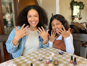 Family members making their own nail polish with a DIY Kit Creations Kit